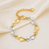 Zweifarbiges Edelstahlarmband in Gold & Silber mit Herzgliedern – elegantes 18K Schmuckstück von LOÉAR