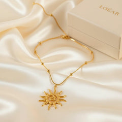 18K vergoldete LOÉAR Halskette mit Sonnenanhänger und Spiral-Design – Golden Sun Spiral Necklace