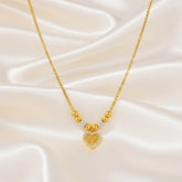 Goldene Edelstahlkette mit Herzanhänger und Lebensbaum von LOÉAR