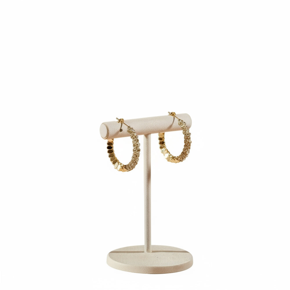 Vergoldete Creolen mit glänzender, strukturierter Oberfläche – elegante, moderne Ohrringe aus Edelstahl von LOÉAR.