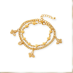 Vergoldetes Armband-Set mit filigranen Herzgliedern und funkelnden Schmetterlingsanhängern – romantisches, elegantes Schmuckdesign aus Edelstahl von LOÉAR.
